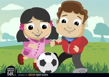 Kinder spielen mit Fußball