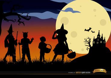 Fundo de silhuetas disfarçadas de crianças de Halloween