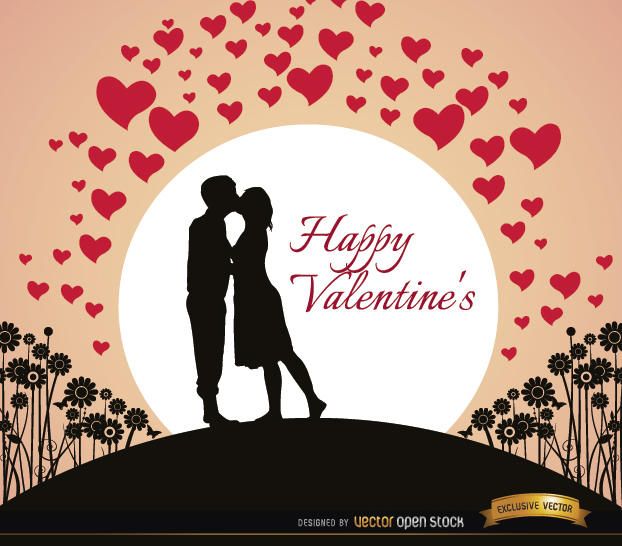 Pareja besando la tarjeta de san valentin Pareja besando la tarjeta de san valentin